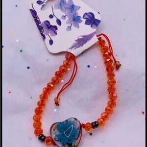 New. Orange Hand crafted Love and Gratitude Artisan bracelet from Oaxaca Mexico.